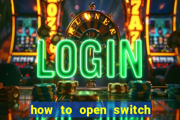 how to open switch oled game card slot